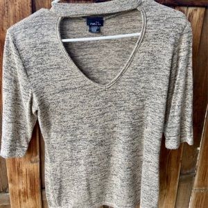 tan v-neck shirt, nice for business casual attire.